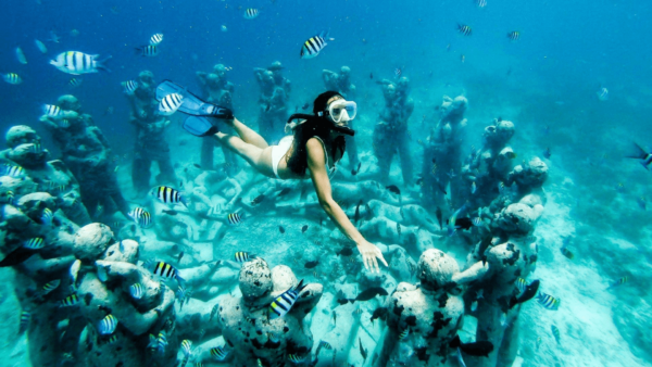 Isla Mujeres en Catamarán + Excursión a Chichén Itzá + Cozumel en Catamarán + Excursión a Tulum 4×1